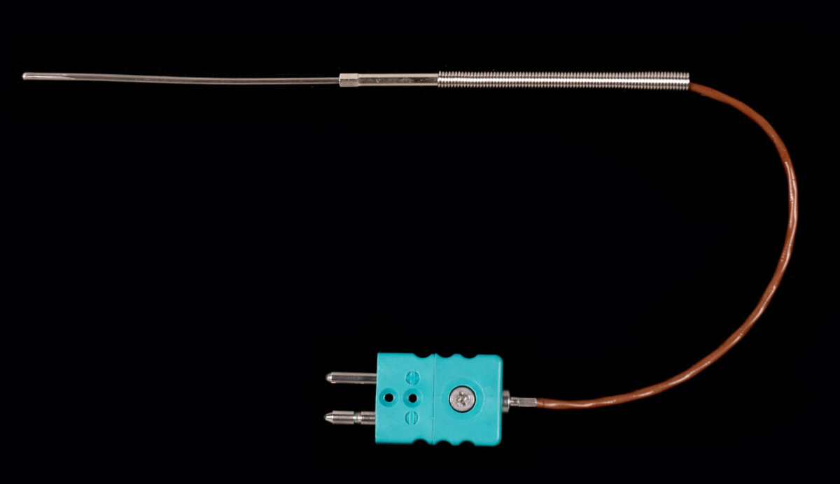 Thermocouple with standard connector and anti-kink spring